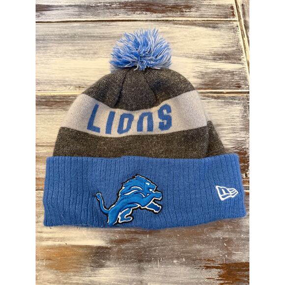 Detroit Lions New Era Banner Cuffed Knit Hat with Pom - Picture 1 of 3